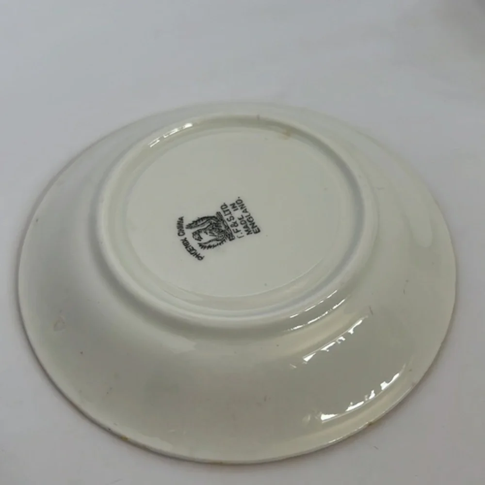 TF& S LTD, DEMITASSE CUP AND SAUCER